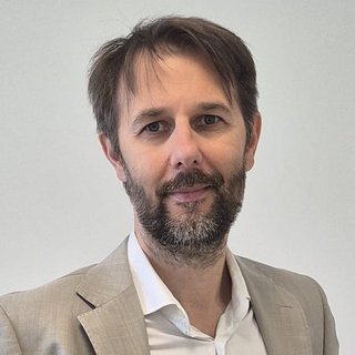 Dr. Dario Fassini